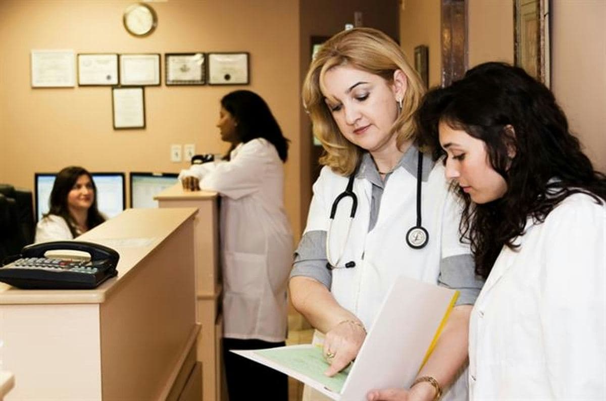 Revenue cycle and claims specialists reviewing accounts